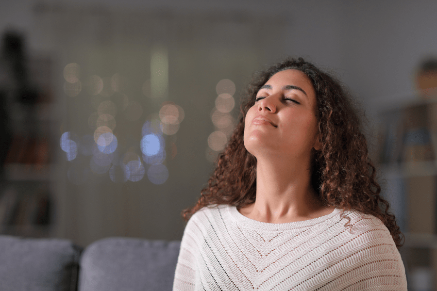 woman practicing deep breathing