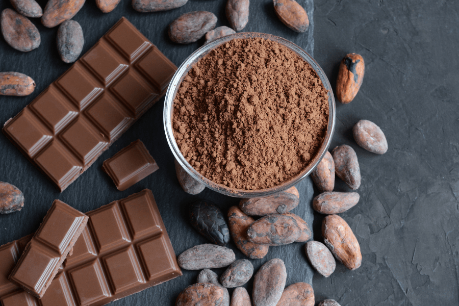 cocoa powder, bars of chocolate and chocolate beans
