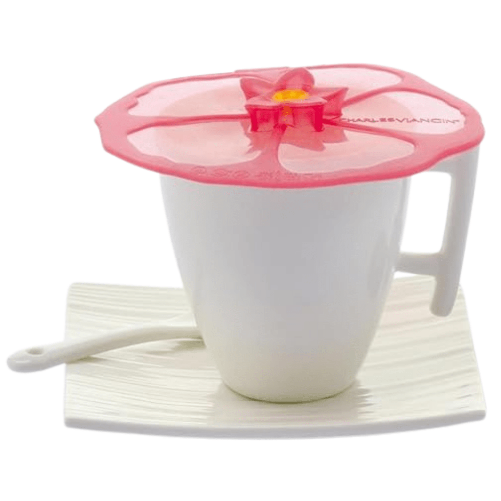 silicone mug cover on the cup with spoon and saucer